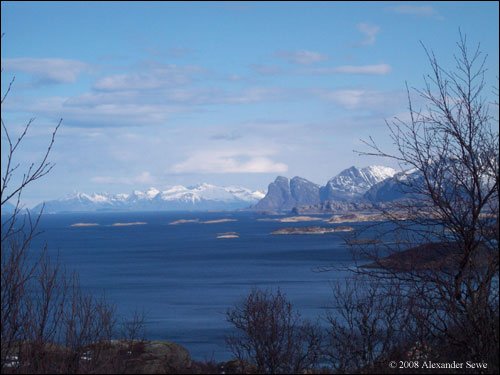 Norwegian ocean and snow covered mountains