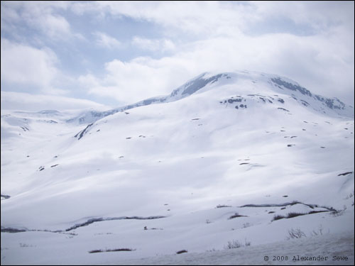 Norwagian mountaintop covered in snow